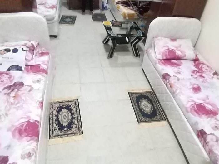 Beds available in Hall for rent in TECOM only for female